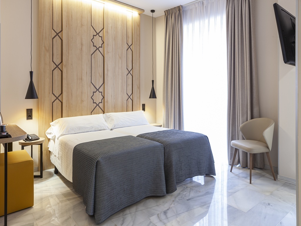 Chambre double avec lit supplémentaire