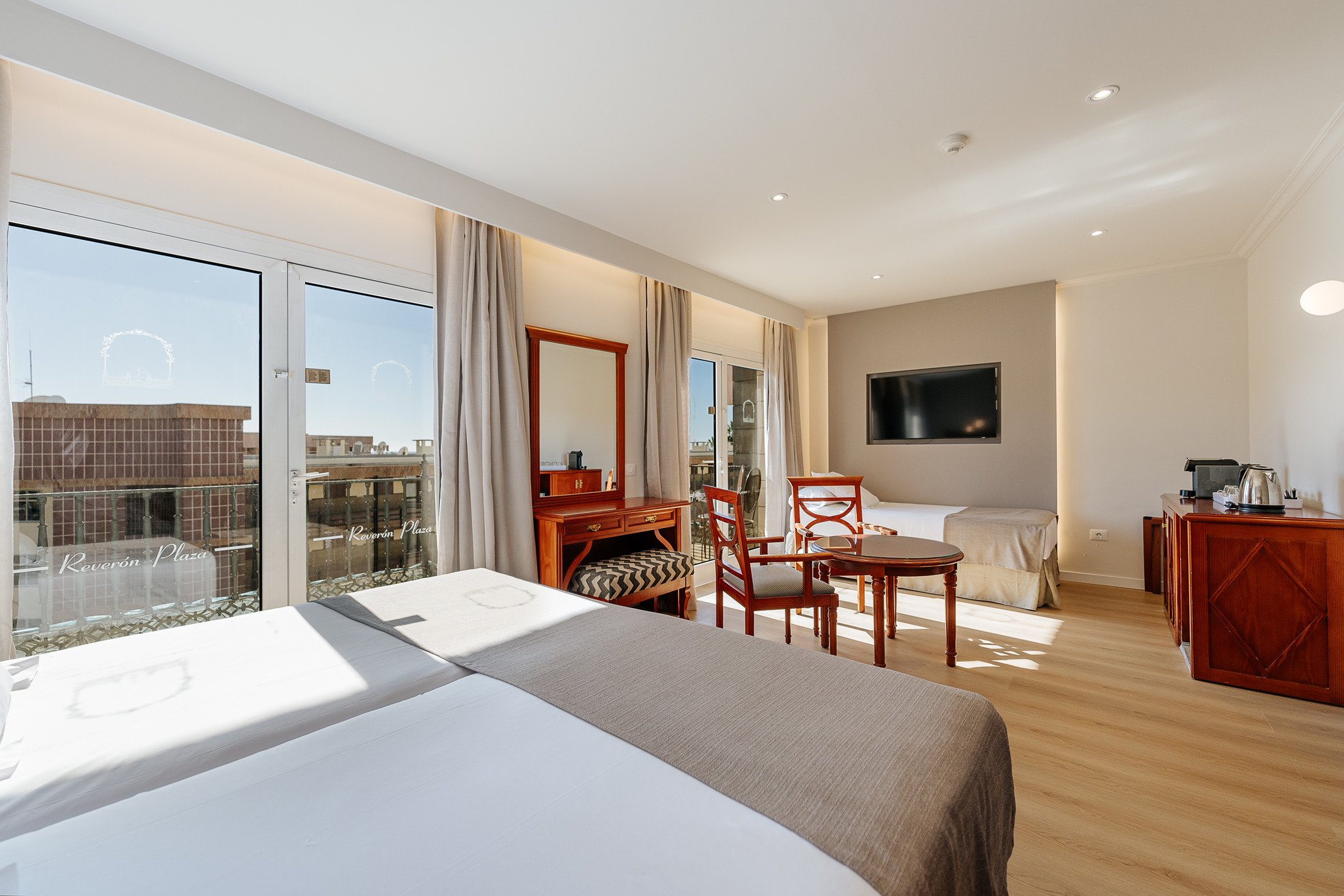 Triple - Reveron Plaza