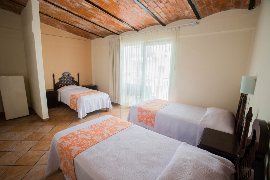 One King Size Bed and Three Singles Village View