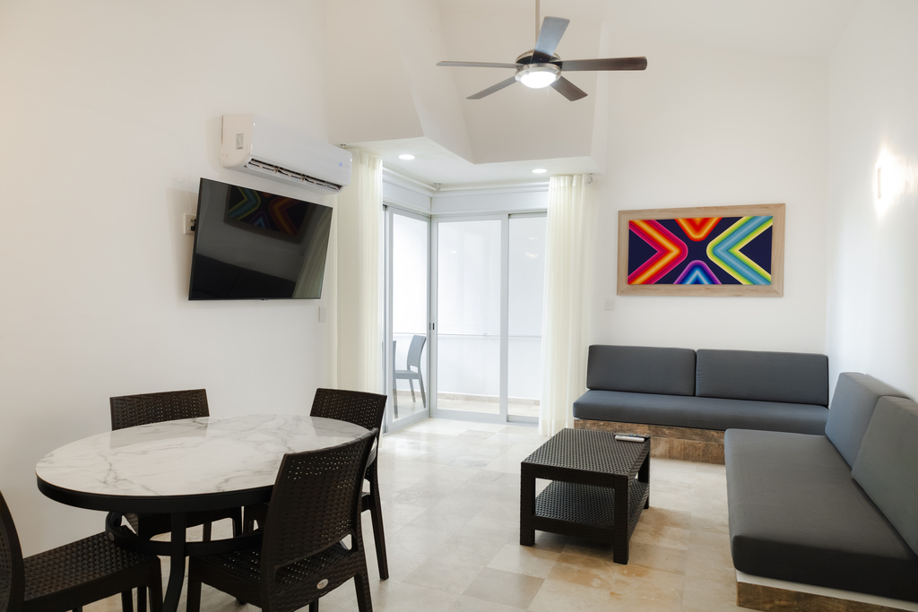 One bedroom suite with two double beds and 3 sofa beds, with terrace