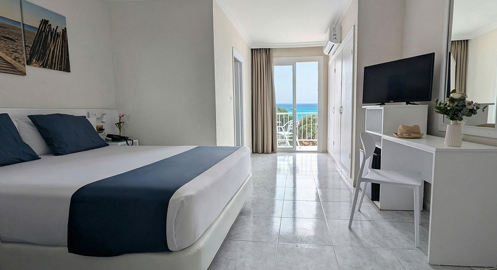 Dreibettzimmer mit Balkon