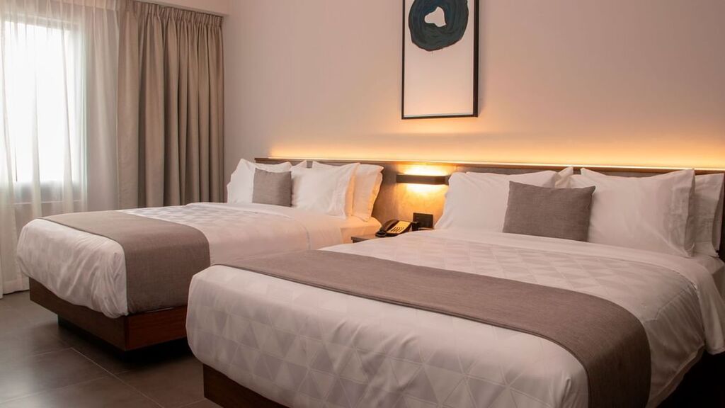 Habitación de Lujo Dos Camas Queen Vista al Mar