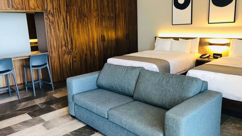 Junior Suite con Dos Camas Queen Vista al Mar