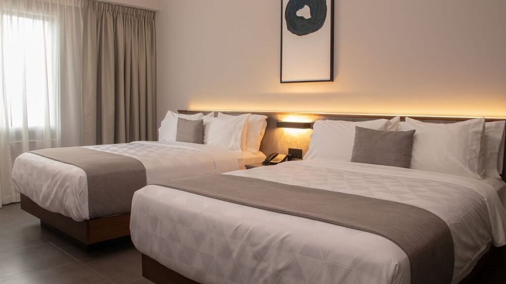 Habitación de Lujo Dos Camas Queen Vista a la Ciudad