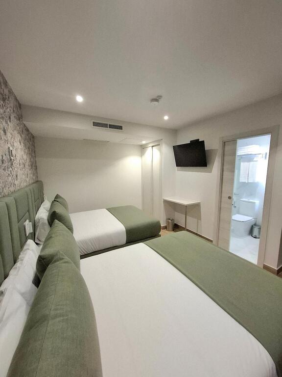 Quadruple Room 2 Double Beds with Private Bathroom